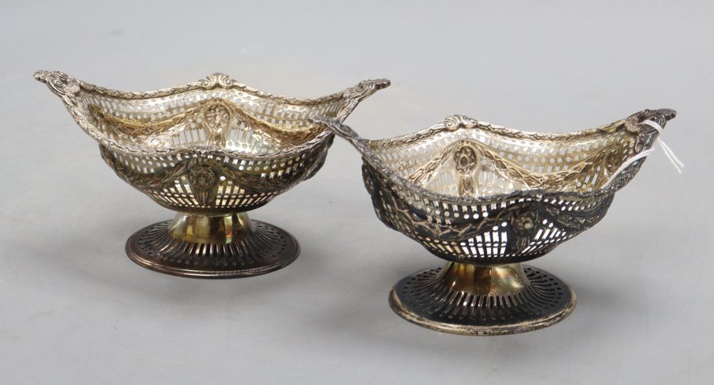 A pair of late Victorian pierced silver oval bonbon baskets by Charles Stuart Harris, London, 1897, 15.8cm, 9 oz.